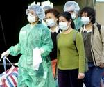 Under udbruddet i Asien forsøgte folk at beskytte sig ved hjælp af masker. - Arkivfoto: AP 