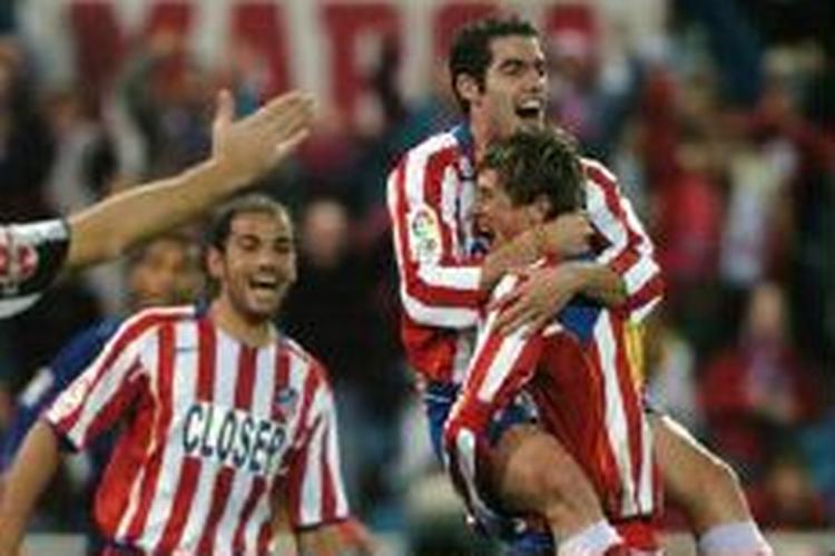 Atletico-spillerne jubler efter kampens enlige mål. - Foto: AP 
