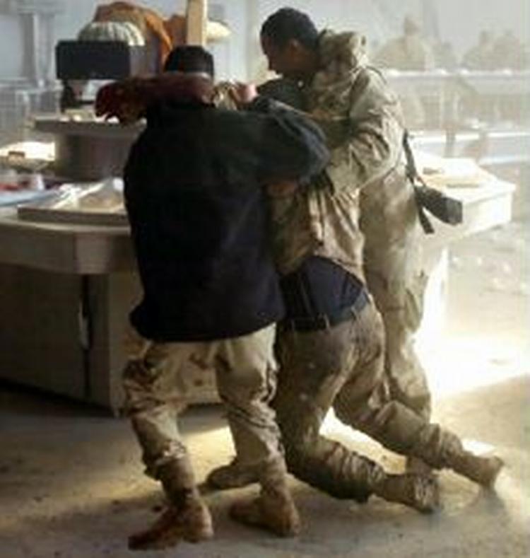 18 amerikanere mistede livet ved angrebet. - Foto: AP 