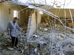 Den udbombede politistation i Mukashifa syd for Tikrit, hvor angriberne dræbte 12 betjente.   Foto: Bassem Daham/AP 