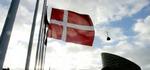 Selv om Danmark som eneste EU-land ikke holdt tre minutters stilhed, blev der flaget på halv i hele landet - her på Vesterbro, København. - Foto: AP 