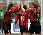 Andrej Sjevtjenko (th) scorede et enkelt mål i 3-1-sejren over Udinese. - Foto: AP 