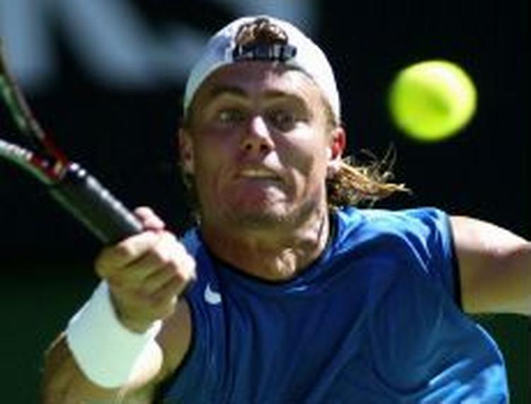 Hewitt skulle bruge fem sæt for at besejre spanieren Rafael Nadal. - Foto: AP 