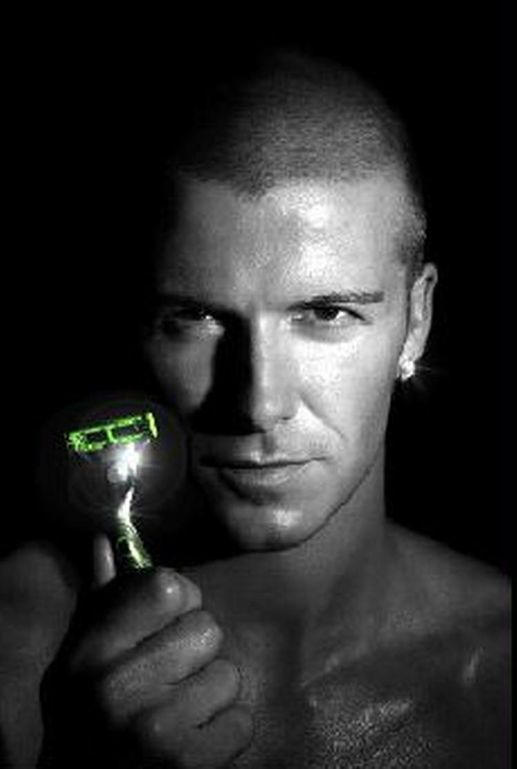 David Beckham er sponseret af Gillette. Nu betaler Procter &amp;amp; Gamble hans løn. - Arkivfoto: AP 