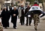 Den arabiske tv-satellitkanal Al-Arabiyya hæftede sig ved den irakiske valgdeltagelse. - Foto: AP 