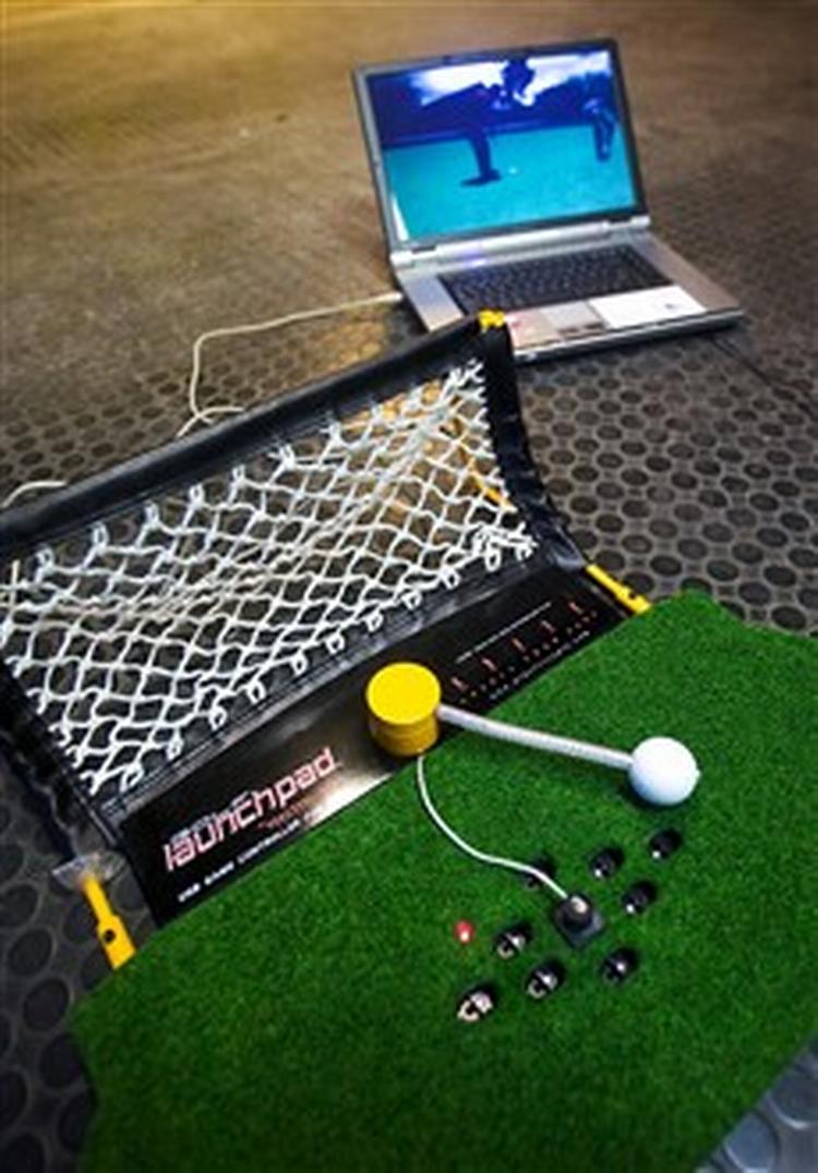 Er vejret for skidt til udendørs golf, er  Golf Launchpad  et sjovt, men også dyrt alternativ, der kræver tilvænning. Foto: Klaus Holstein 