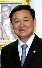 Thaksin Shinawatra synes sikker på genvalg ved søndagens valg. Blandt andet har den hårde kurs overfor separatisterne i syd sikret ham massiv folkelig opbakning. - Foto: AP 