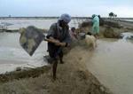 Et stort genopbygningsarbejde venter efter en dæmning brød sammen i Baluchistan-provinsen i Pakistan. - Foto: AP 