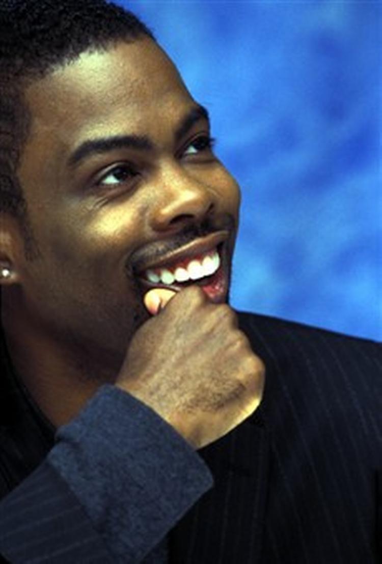 »Priser er jo bare noget lort, man giver til idioter«, har Chris Rock sagt. Nu skal han være årets konferencier ved oscarfesten.   Foto: Kahana Yoram/AP 
