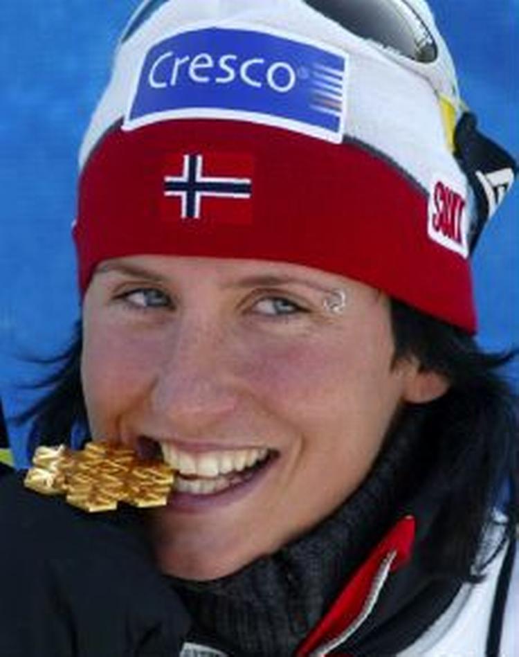 'Det er det største jeg har oplevet', siger Marit Bjørgen. - Foto: AP 
