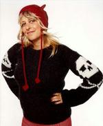 STRIKKEBITCH. Debbie Stoller vil lægge vægt på glæden frem for farerne ved at være kvinde. Man kan godt være både modeinteresseret og feminist.   Foto: www.workman.com 