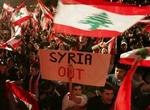 Der er daglige demonstrationer i Libanons hovedstad Beirut med krav om, at syrerne skal trække sig helt ud af landet. - Foto: AP 