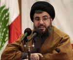 Leder af libanesisk Hizbollahs, Sayyed Hassan Nasrallah, på en pressekonference i dag, hvor han opfordrer til demonstrationer til støtte for Syrien. - Foto: AP 