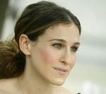 Ugifte - som Carrie Bradshaw, spillet af Sarah Jessica Parker, i tv-serien 'Sex in the City' - er mere intelligente end de gifte, påviser en britisk undersøgelse. Foto fra tv-serien 