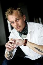 Tidligt fik Jan Grarup smag for historiens sorte kapitler. Som nystartet elev på Ekstra Bladet dækkede han Ceaucescus fald i Rumænien. - Foto: Thomas Borberg 