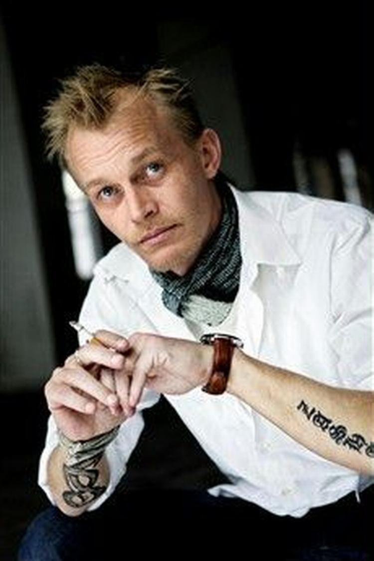 Tidligt fik Jan Grarup smag for historiens sorte kapitler. Som nystartet elev på Ekstra Bladet dækkede han Ceaucescus fald i Rumænien. - Foto: Thomas Borberg 