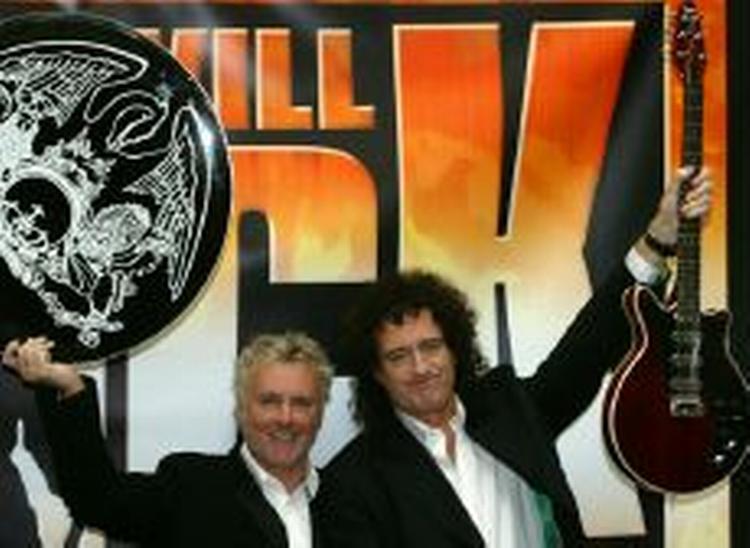 Med på scenen er de oprindelige medlemmer trommeslager Roger Taylor og guitarist Brian May. - Arkivfoto: AP 