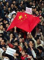 Vrede demonstranter i Beijings gader. - Foto: AP 