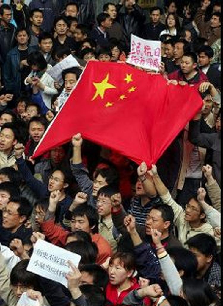 Vrede demonstranter i Beijings gader. - Foto: AP 