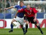 Søren Colding i nærkamp med Hanover's Jiri Stajner. - Foto: AP 
