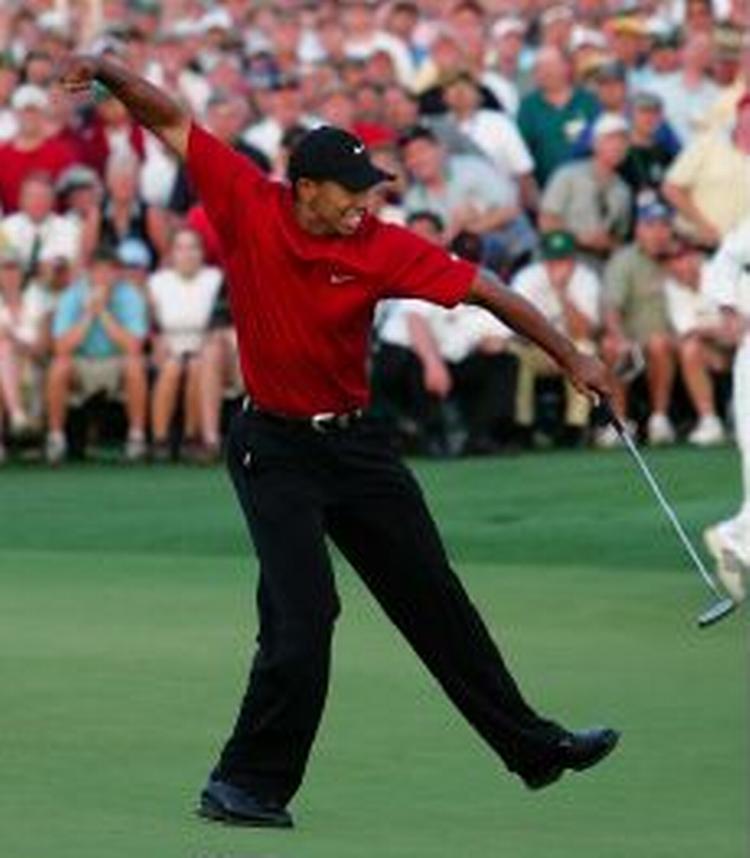 Woods jubler, da sejren var en realitet. - Foto: AP 