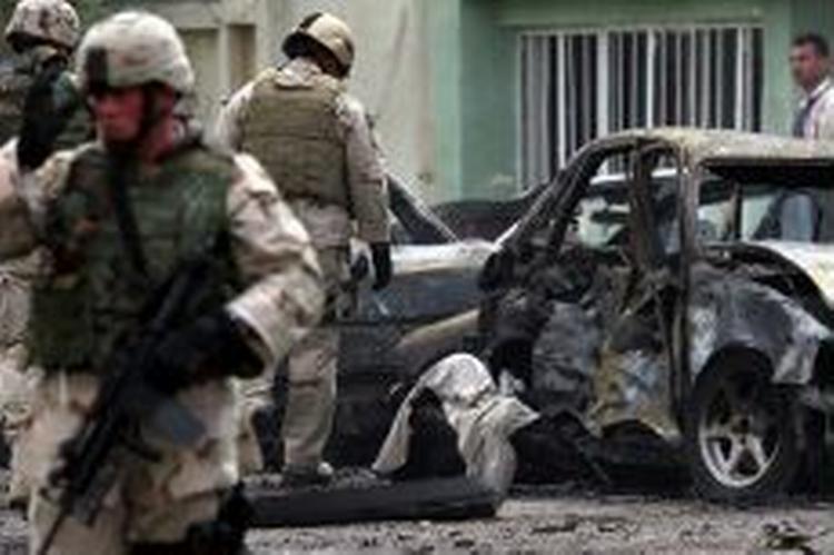 Amerikanske soldater afspærrede hurtigt området. - Foto: AP 