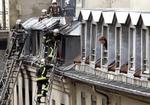 En kvinde har nu erkendt, at hun ved en fejl antændte den alvorlige brand på Opera Hotel i Paris i fredags. - Foto: AP 