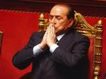 Silvio Berlusconi vil i morgen kæmpe for sit politiske liv, når han taler i senatet og til parlamentet. - Foto: AP 