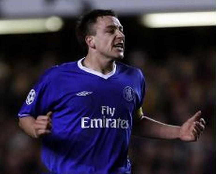 Chelsea-anfører John Terry har krydret en suveræn succes for Chelsea med titlen som årets spiller i England. - Foto: AP 