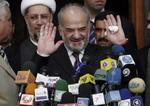 Præsident Ibrahim al-Jaafari på et pressemøde i går, hvor han sagde, at han havde en ministerliste, som parlamentet skulle godkende. - Foto: AP 