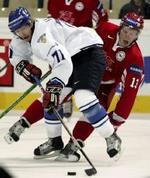 Morten Green i nærkamp med finnen Kallio (hvid). - Foto: AP 