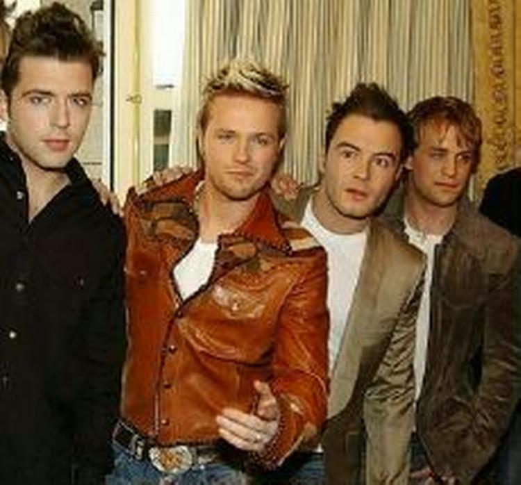Westlifes fire medlemmer - fra venstre: Mark Feehily, Nicky Byrne, Shane Filan og Kian Egan. - Foto: AP 
