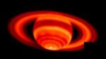 De 12 nye måner har alle en omløbstid om Saturn - der her ses på et infrarødt foto - på omkring to år. - Arkivfoto: AP 