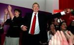 Tony Blair sammen med sin kone Cheri. - Foto: AP 