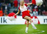 Borgerlige texanere kan ikke lide de dansende heppekor - de er for frække. Her en tækkelig dansk cheerleader til fodbold. - Foto: Thomas Borberg 