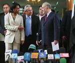 Rice (tv.) og Iraks premierminister Ibrahim al-Jaafari (yderst th.) på dagens pressemøde i Bagdad. - Foto: AP 