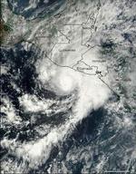 Sådan så orkanen 'Adrian' ud fra NASA's satellit i går, inden den ramte El Salvadors kyst. - Foto: AP 