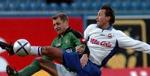 Lantz (th.) i aktion for Hansa Rostock. - Arkivfoto: AP 