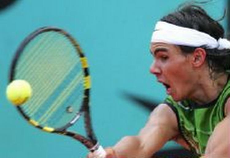 Tennisbolde mister hurtigt pusten og må skiftes. En ny pumpemetode skal give dem nyt liv. Måske godt nyt også for spilleren, spanske Rafael Nadal. - Foto: AP 