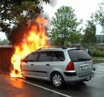 En Peugeot 307 i lys lue. - Foto: www.alarm112.dk 