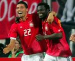 Kevin Kuranyi og Gerald Asamoah jubler efter tyskernes andet mål. - Foto: AP 