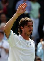 Marat Safin har tidligere haft sit hyr med Wimbledon. I år går det bedre. - Foto: AP 