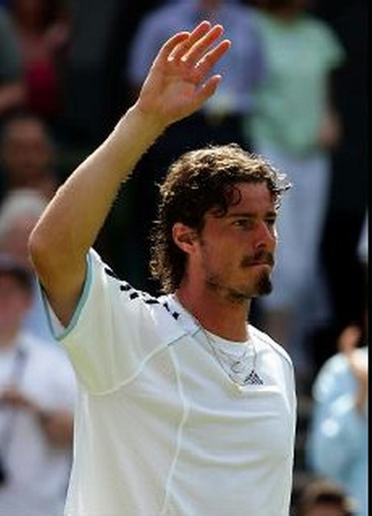 Marat Safin har tidligere haft sit hyr med Wimbledon. I år går det bedre. - Foto: AP 