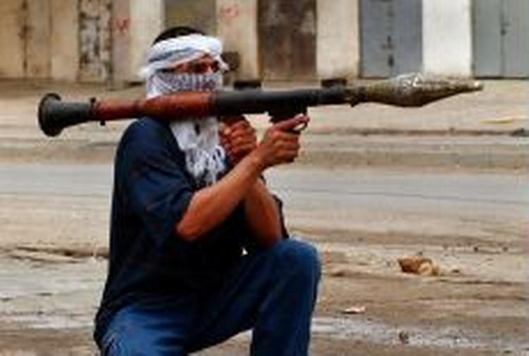 Oprørerne i Irak kan udgøre en stor sikkerhedsrisiko for deres hjemland, når de vender hjem fra Irak. - Arkivfoto: AP 