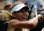 Maria Sjarapova viser tænder under kampen. - Foto: AP 