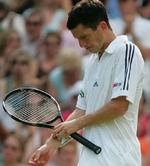 En skuffet Henman efter nederlaget. - Foto: AP 