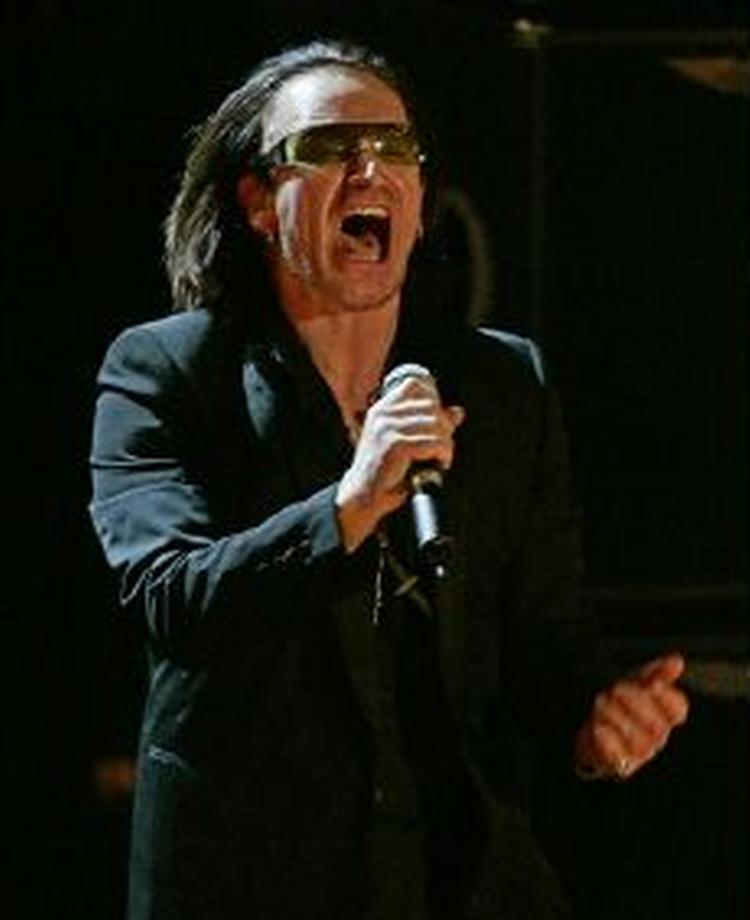 Bono og resten af U2 er en god forretning for Dublin, der spinder guld på rockbandet. - Foto: AP 