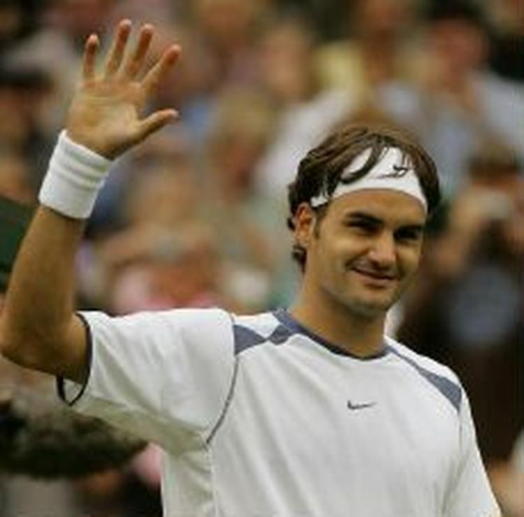 En lettet Federer efter sejren. - Foto: AP 