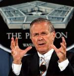>»Vi taler med folk hele tiden«, siger Rumsfeld. - Foto: AP 