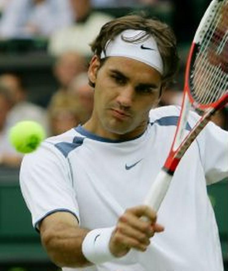 Roger Federer holdt koncentrationen og slog Hewitt i en kamp, der aldrig var spændende. - Foto: AP 